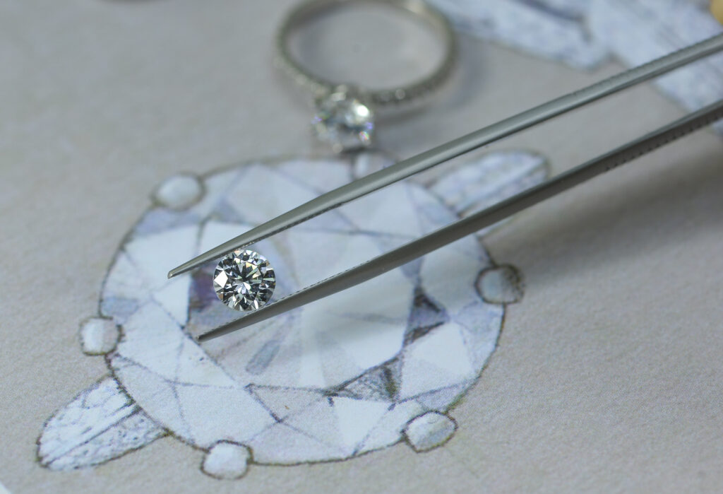 Close up of diamond engagement ring prong setting showing stone security and prong tips
