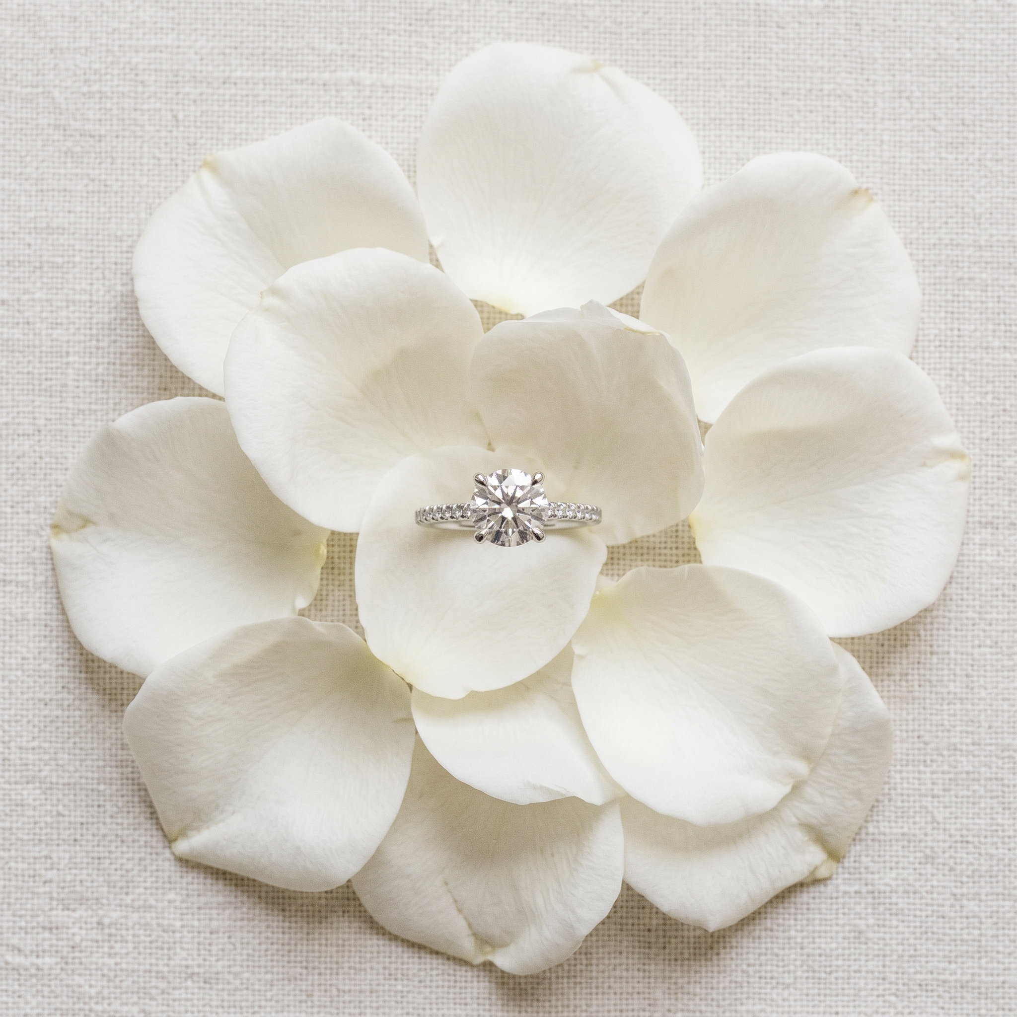 Diamond engagement ring flat lay — $2,000 in lab grown gets you over 1 carat with excellent cut