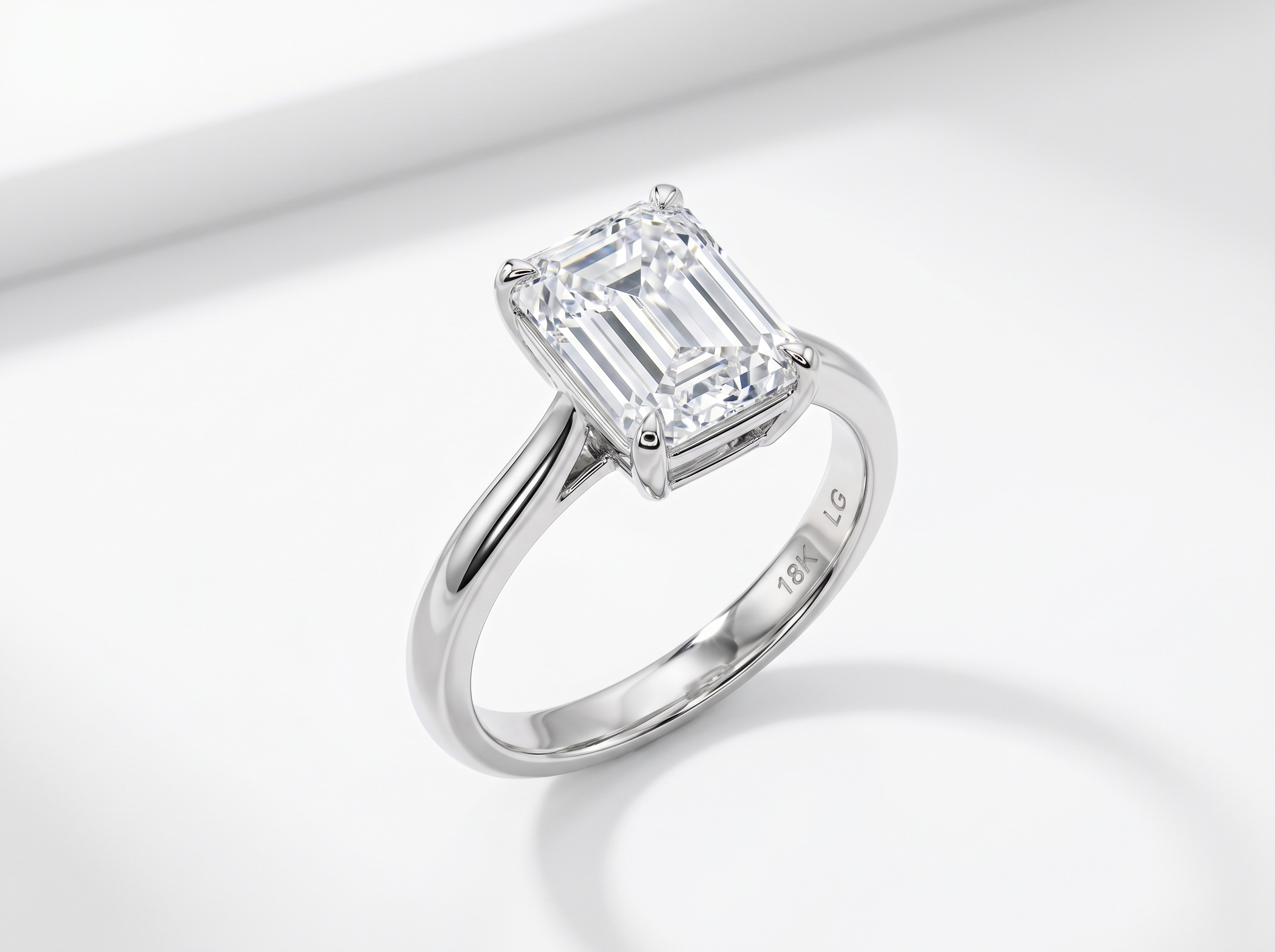 Emerald cut lab grown diamond engagement ring close-up — $4,000 buys 2+ carats with outstanding clarity in 2026